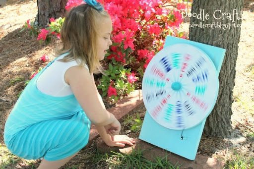 girl spinning wheel